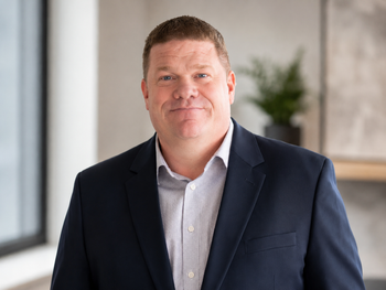 Portrait of Kevin Perry, Real Estate Advisor.
